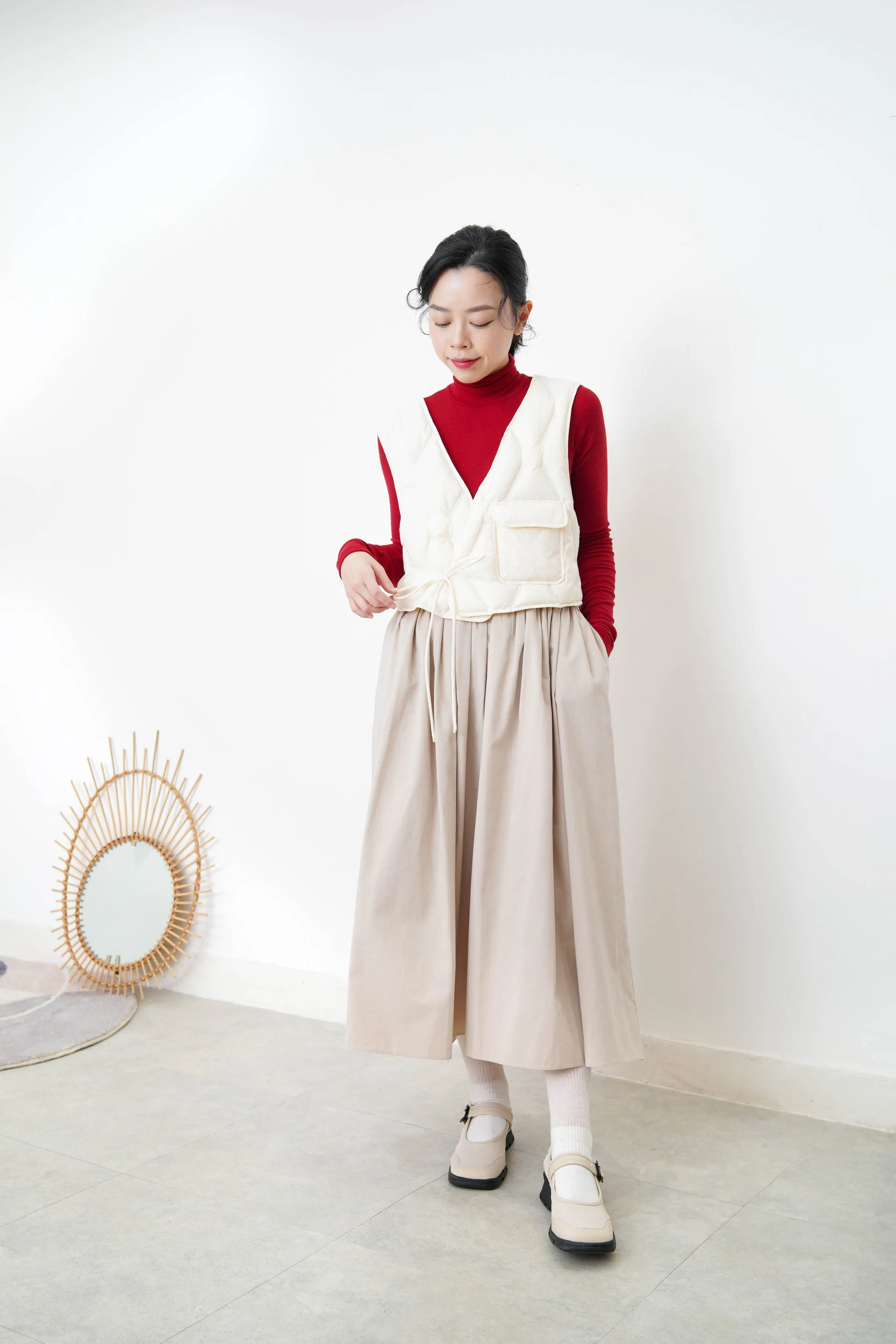 Ivory padded down vest w/ pocket