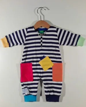 Onesie in cotton with colored patches Onesie in cotton with colored patches